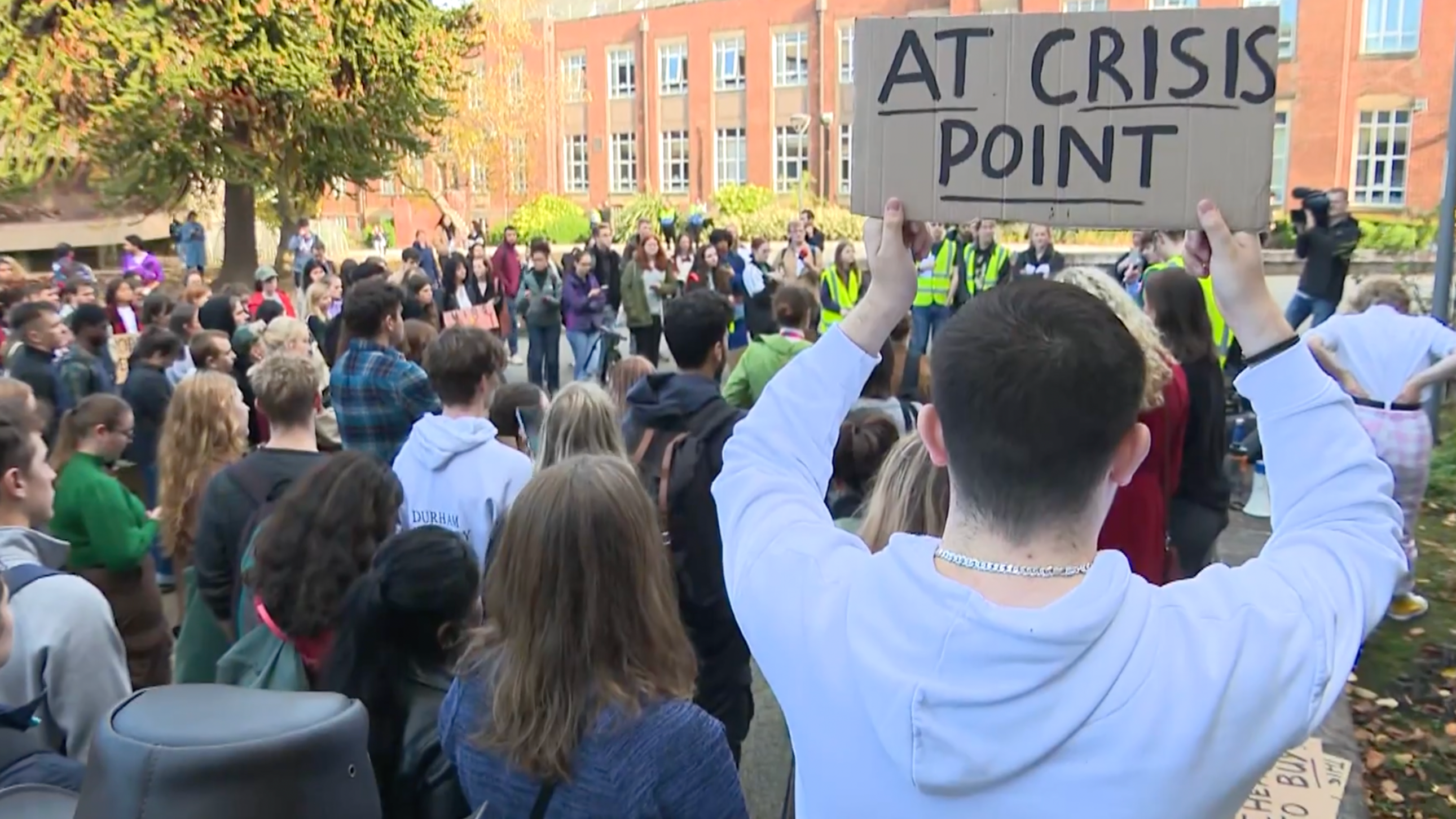 students queing to get accommodation