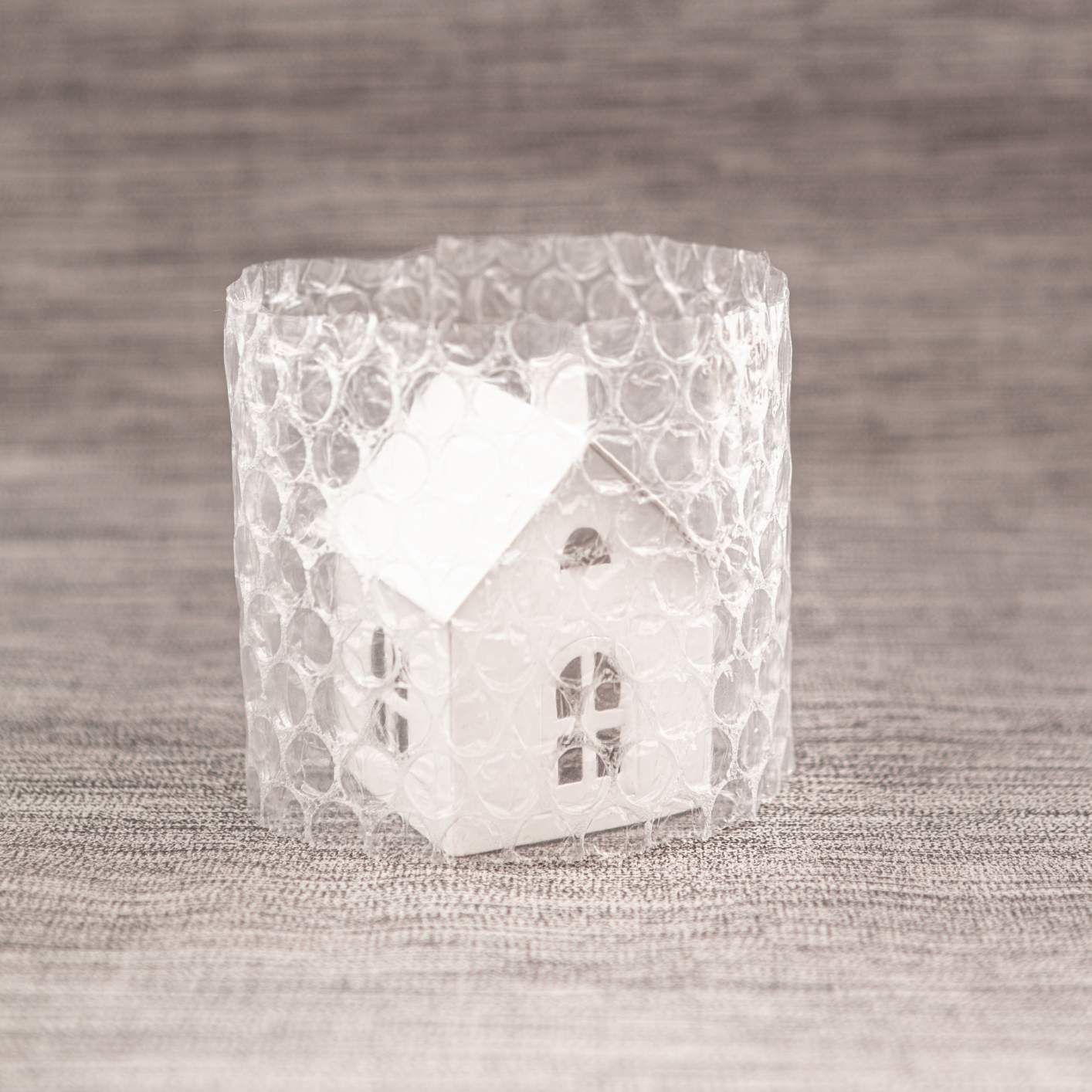 house in bubble wrap